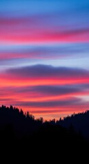 Obraz premium Spectacular pink and blue light floods the sky, casting dramatic silhouettes over dense forest wilderness at dusk, silhouette, beautiful, forest