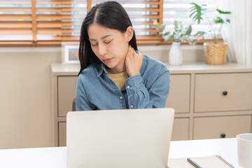 Body muscles hurt stiff, face suffering asian young woman, girl neck pain, body ache while sitting work at home, holding massaging rubbing back, problem health care of office syndrome people concept.