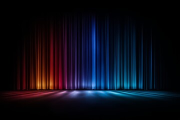 Colorful curtain with a dark background. The curtain is made up of many different colors, including red, blue