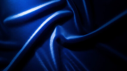 Elegant Deep Blue Silk Satin Fabric Background with Smooth Ripples and Luxurious Folds