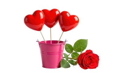 Three red heart balloons in pink bucket with red rose