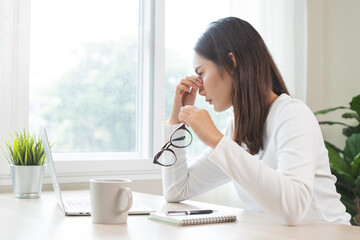 Eye problem concept, fatigue asian young woman tired eyes, irritated rubbing nose, relief vision...