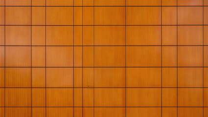 Vibrant orange plaid pattern with dark lines on fabric