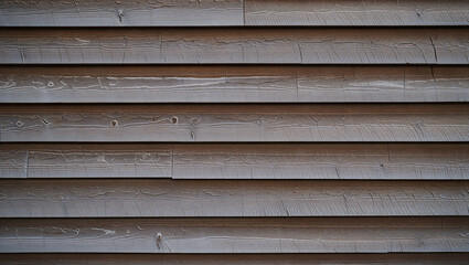 Close up of weathered gray wooden horizontal slats