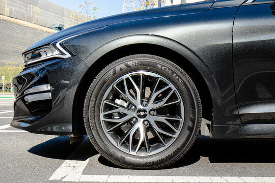 October 27, 2021, Seoul, South Korea - A close-up view of the front wheel and tire of a Kia K5 sedan.