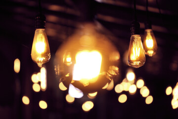 Group of lamps with interesting shape of tungsten filament.