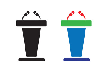 Two podiums with microphones stand side by side in a public speaking setting