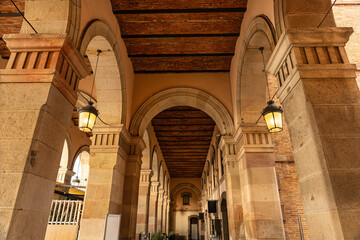 Monumental buildings with brick arches in the portside neighbourhood of Barcelona, Catalonia.