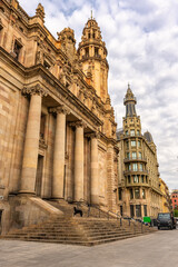 Huge neoclassical buildings in the city of Barcelona with impressive architecture, Catalonia.