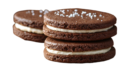 Stacked brown cookies with light filling