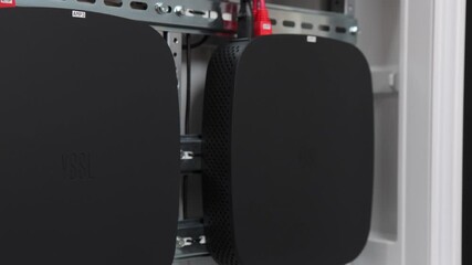 Electrical panel with Internet equipment and multimedia equipment.  - Powered by Adobe