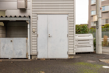 sidewalk by street wall  and  door