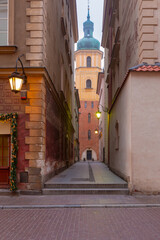 Narrow Alley and Tower in Old Town Warsaw Poland