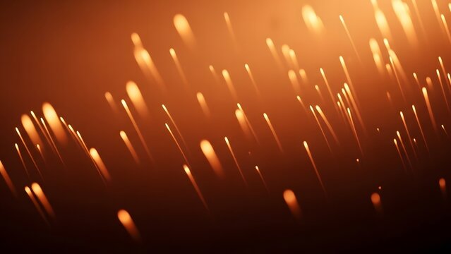 Dynamic motion blur effect with glowing orange particles rising against a gradient background