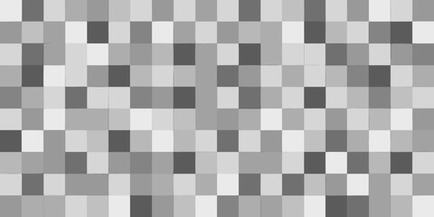 Fototapeta premium A grayscale mosaic pattern composed of varying shades of gray squares