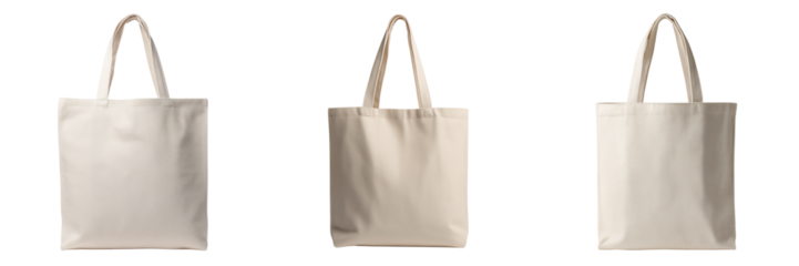Three plain canvas tote bags with handles in a row on a white background isolated on a transparent background