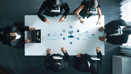 A dynamic business meeting featuring professionals wearing virtual reality headsets in a modern...