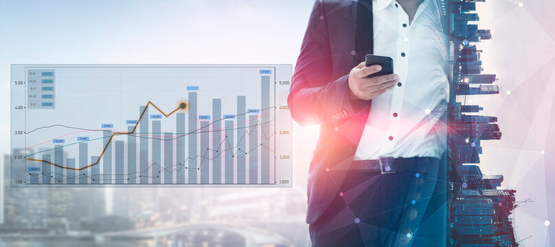 A businessman stands with a smartphone, surrounded by a graph depicting financial growth against a modern urban landscape, highlighting data-driven decision-making. Scalp - Powered by Adobe