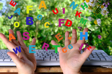 female hands, scattering of multi-colored different letters over computer keyboard, overload concept, nervous breakdown deadline, negative emotional state, human brain development, literacy problems