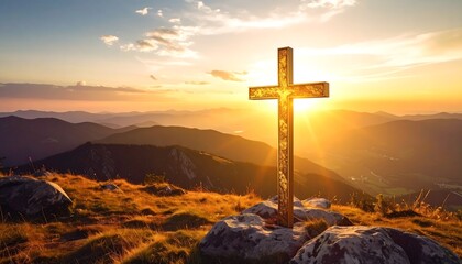 Golden Cross Silhouetted Against a Majestic Mountain Sunset
