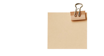 piece of beige paper with tape and a clip