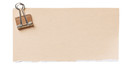 piece of beige paper with tape and a clip