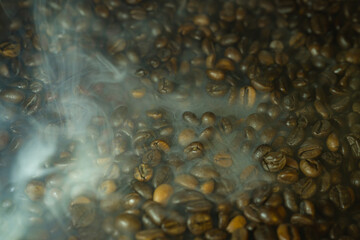 Roasted Coffee Beans with Steam and Haze Background