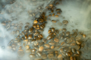 Roasted Coffee Beans with Steam and Haze Background