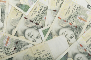 This macro shot displays a collection of two thousand Czech Koruna banknotes, capturing intricate details of the currency, Czech Republic.