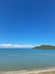 Fototapeta premium High angle view of boats traveling across a calm blue bay