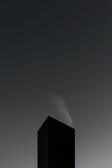Monochromatic smokestack against a sky, emphasizing texture, geometry and the industrial era.