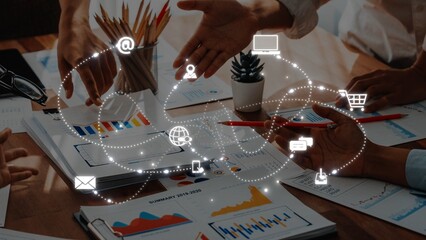 A dynamic team engages in a collaborative discussion, surrounded by data visualization tools and digital communication symbols, showcasing modern business interactions. Raster
