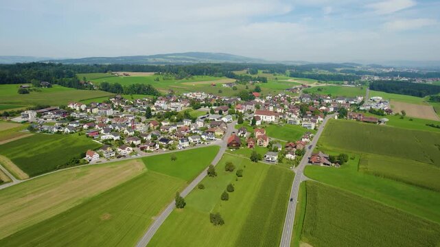 Driving around the swiss alps in the village schmitten on a sunny day in summer