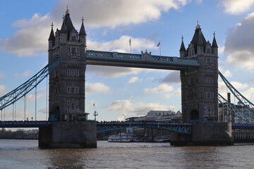 Obraz premium Panorama of famous Tower Bridge over the river Thames against cloudy sky in London, England, United Kingdom.