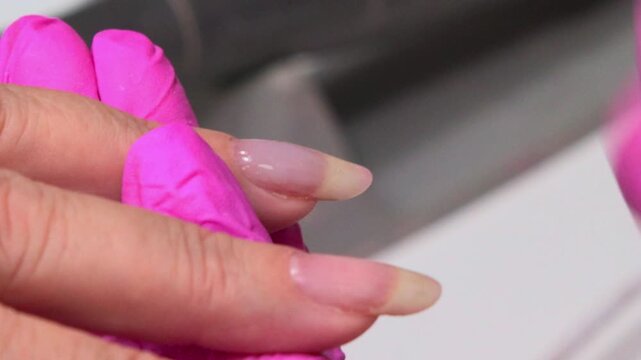 Detailed View Of Nail Enhancement Technique Using Builder Gel And Fine Brush With Neat Outcomes. Media