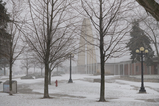 winter storm at Centennial Park in Exhibition Place, Toronto (with view of Dufferin Gate arch)