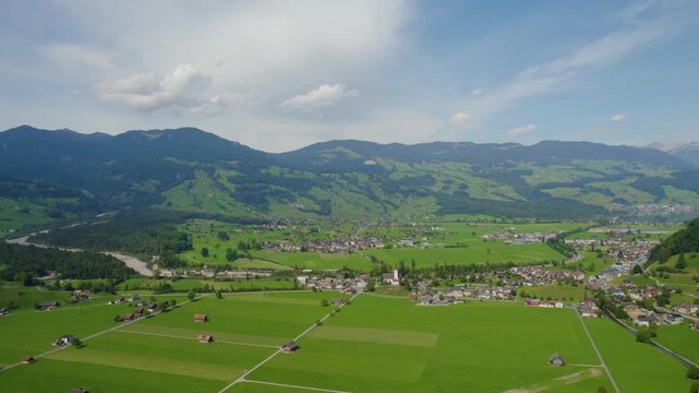 Aerial view around the city Giswil beside the the lake Sarnen in Switzerland on a sunny day in summer. 