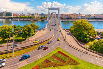 Elisabeth Bridge over the Danube River with historic buildings of Pest city center, sunny day aerial view, Budapest, Hungary