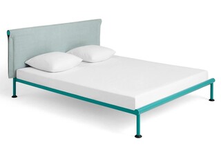 Classic double bed with big headboard isolated on white