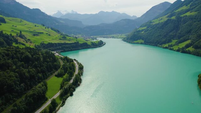 Aerial view around the city and lake Lungern in Switzerland on a sunny day in summer.