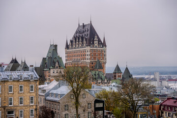 Obraz premium Chateau Frontenac hotel above historic buildings in Quebec City