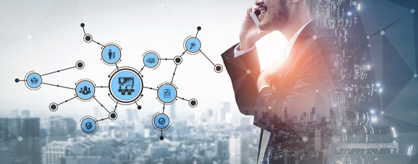 A businessman on the phone is surrounded by a digital network overlay, symbolizing modern communication and connection in a bustling cityscape. Tessel