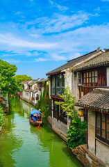 View of the famous water town called Zhouzhuang on a sunny day near Suzhou and Shanghai in China.