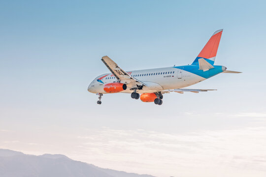 5 November 2025, Batumi, Georgia: Commercial airplane with landing gear down nearing arrival. Azimuth Airlines aircraft