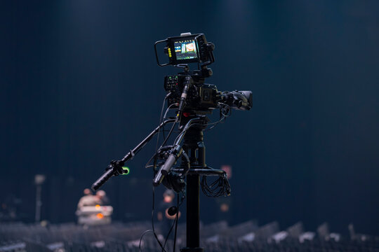 Professional video camera setup on jib with accessories and cables for live production