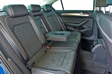 Rear seats covered with fabric in a luxury car