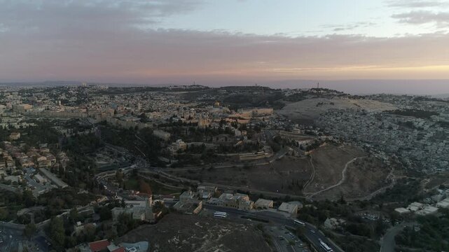 Aerial Jerusalem Old City Temple Mount

Drone footage overlooking the Old City of Jerusalem with the Temple Mount and Dome of the Rock during golden hour, December 24 2025.
