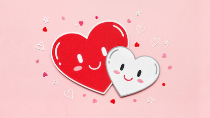 Fun hearts and smiling faces create a cheerful scene on a pink background for celebration or decoration