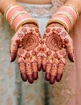 Indian Bridal Mehndi Design on Hands with Traditional Bangles and Wedding Jewelry
