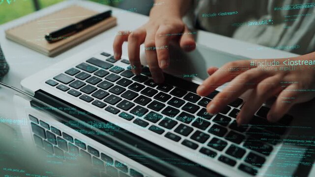 A focused programmer actively engages in writing code on a laptop, surrounded by digital texts, showcasing the dynamic nature of software development and innovation. Xenic